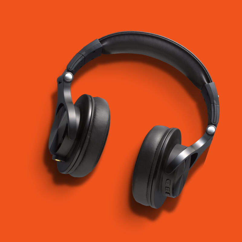 Black headphones on a yellow background